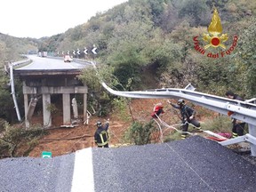 A portion of a motorway bridge linking Savona to Turin is seen after it collapsed due to a landslide near Savona, Italy, Nov. 24, 2019. (Vigili del Fuoco/Handout via REUTERS)