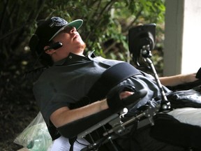 Jesse Kay is pictured in his wheelchair on  July 08, 2013. (Craig Robertson, Toronto Sun)