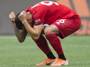 Toronto FC defender Auro (96) reacts to losing to the Seattle Sounders following MLS Cup soccer final in Seattle on Sunday, November 10, 2019. THE CANADIAN PRESS/Jonathan Hayward
