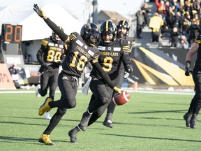 Hamilton Tiger Cats wide receiver Brandon Banks (16) celebrates his touchdown reception from quarterback Dane Evans in Hamilton on Sunday.  THE CANADIAN PRESS/Peter Power