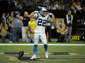 Carolina Panthers running back Christian McCaffrey  celebrates after scoring a touchdown against New Orleans on Sunday. (USA TODAY SPORTS)