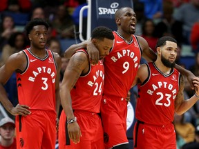 Toronto Raptors forward Serge Ibaka (9) is helped off the court by guards Norman Powell (24) and Fred VanVleet (23) in the second quarter against the New Orleans Pelicans at the Smoothie King Center. Chuck Cook-USA TODAY Sports