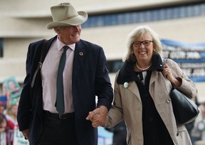 Elizabeth May, accompanied by her husband John Kidder, arrives for the English-language Federal Leaders Debate at the Canadian Museum of History in Gatineau, Quebec on October 7, 2019. (Photo by Chris Wattie / POOL / AFP)