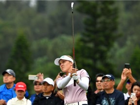 This handout photograph taken and released by IMG on November 3, 2019 shows Brooke Henderson of Canada hitting a shot during the final round of the Taiwan Swinging Skirts LPGA tournament at the Miramar Golf and Country Club in New Taipei City.