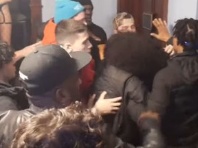 An image from video of the knife attack at a Madison Ave. frat house.