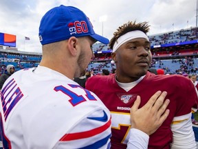 Bills QB Josh Allen, left, shakes hands with Redskins QB Dwayne Haskins after the game at New Era Field in Orchard Park, N.Y., on Sunday, Nov. 3, 2019.