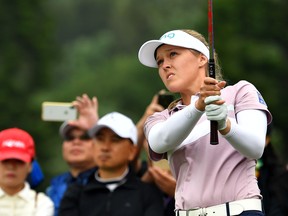 This handout photograph taken and released by IMG on Nov. 3, 2019 shows Brooke Henderson hitting a shot during the final round of the Taiwan Swinging Skirts LPGA tournament at the Miramar Golf and Country Club in New Taipei City. (PAUL LAKATOS/IMG/AFP via Getty Images)
