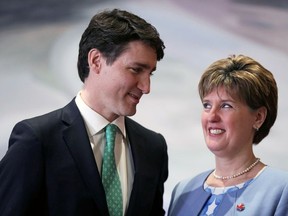 Canada's Prime Minister Justin Trudeau congratulates Marie-Claude Bibeau after she was sworn-in as Minister of Agriculture and Agri-Food during a cabinet shuffle at Rideau Hall in Ottawa, Ontario, Canada, March 1, 2019.