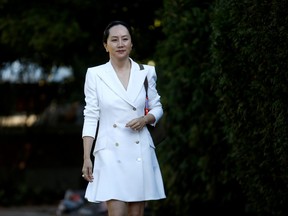 Huawei Technologies Chief Financial Officer Meng Wanzhou leaves her home to appear in British Columbia supreme court for a hearing, in Vancouver September 30, 2019.  REUTERS/Lindsey Wasson