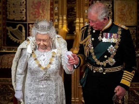 Queen Elizabeth and Charles, the Prince of Wales are seen during the State Opening of Parliament in the House of Lords at the Palace of Westminster in London, England, on Oct. 14, 2019.