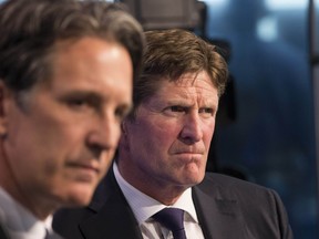 Mike Babcock (R) press conference announcing he is the new head coach of the Toronto Maple Leafs in Toronto on Thursday May 21, 2015. Craig Robertson/Toronto Sun/Postmedia Network