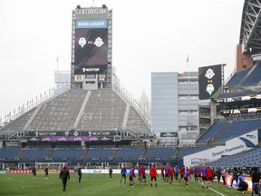 Toronto FC players warm up for a training session at CenturyLink Field. USA TODAY