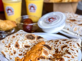 Tribute to Mumbai street food courtesy Butter Chicken Roti gourmet roti shops.