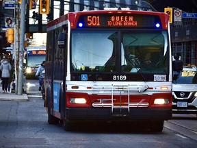 Shuttle buses operate along Queen St. W. in Toronto Thursday, Nov. 28, 2019 replacing the streetcars that normally service the 501 route. (Bryan Passifiume/Toronto Sun)