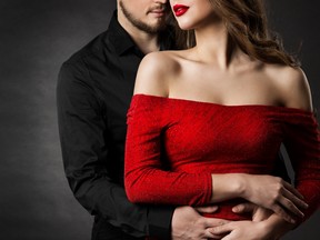 Couple Fashion Beauty, Woman in Red Dress and Embracing Man in Love