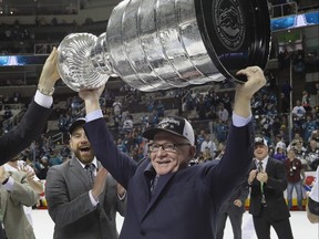 General manager Jim Rutherford holds up the Stanley Cup after his Penguins knocked off the San Jose Sharks in Game 6 three years ago. Rutherford has been GM of three Cup-winners, two in Pittsburgh and one in Carolina.                                                          
 Bruce Bennett/Getty Images