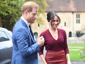 Britain's Prince Harry, Duke of Sussex and Meghan, Duchess of Sussex arrive to attend a roundtable discussion on gender equality with The Queen's Commonwealth Trust and One Young World at Windsor Castle.