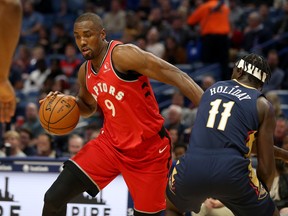 Raptors forward Serge Ibaka (left) could return Wednesday after a 10-game absence due to an ankle injury. (USA TODAY)