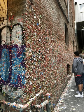 The gum wall in Post Alley under Pike Place Market is gross but sure draws the crowds. (Cynthia McLeod)