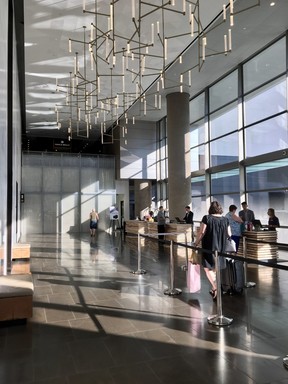 Natural light floods into the reception area of the Hyatt Regency Seattle. The Rickhouse Whiskey Bar at the far end overlooks the lobby. (Cynthia McLeod)
