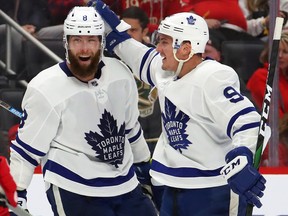 Toronto Maple Leafs' Jake Muzzin, left, celebrates his third period goal with Tyson Barrie while playing the Detroit Red Wings at Little Caesars Arena on Oct. 12, 2019 in Detroit, Mich. (Gregory Shamus/Getty Images)