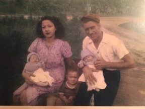 Ernest Earl Keith, right, and his wife and children. His 1976 murder remains unsolved. FAMILY