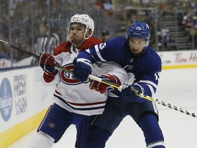 Maple Leafs forward Alexander Kerfoot (right) has been penalized a little more often than he and coach Mike Babcock would like. (John E. Sokolowski/USA TODAY Sports)