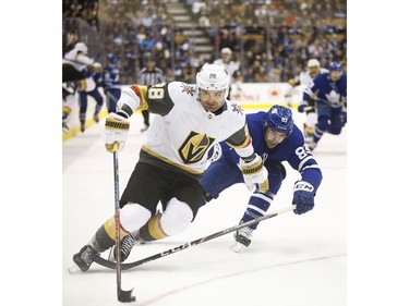 Vegas Golden Knights William Carrier LW (28) tries to go around Toronto Maple Leafs Cody Ceci D (83)during the second period in Toronto on Thursday November 7, 2019. Jack Boland/Toronto Sun/Postmedia Network