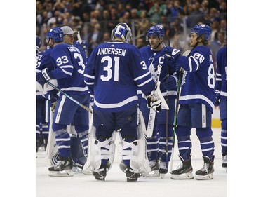 Toronto Maple Leafs John Tavares C (91) congratulates teammate Frederik Andersen G (31) after the OT win  in Toronto on Thursday November 7, 2019. Jack Boland/Toronto Sun/Postmedia Network