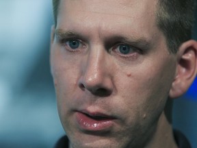 Michel Thibodeau, who successfully sued Air Canada failing to serve him in French during several flights in 2009, is seen here speaking to the media in Ottawa on July 14, 2011. (Andre Forget/Sun files)