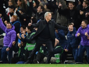 New manager Jose Mourinho celebrates a Tottenham Hotspur goal during their Champions League Group B match against Olympiakos on Tuesday. Tottenham won 4-2. (Glyn KIRK/ Getty Images)