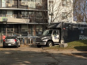 Toronto Police at 1360 Danforth Rd., a highrise in Scarborough, on Sunday, Nov. 24, 2019, a day after Zachary Antrobus, 27, was found shot to death in the building's lobby. (Kevin Connor/Toronto Sun/Postmedia Network)