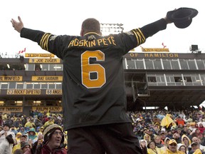 Dan Black, aka Pigskin Pete, whips up the Hamilton Tiger Cats fans before their game against the Winnipeg Blue Bombers at Ivor Wynne Stadium in Hamilton on Saturday October 27, 2012. (THE CANADIAN PRESS/Chris Young)