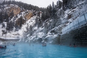 Steam rises from the warm water of the mountain side Radium Hot Springs in Kootenay National Park, British Columbia. Ernest Doroszuk/Toronto Sun