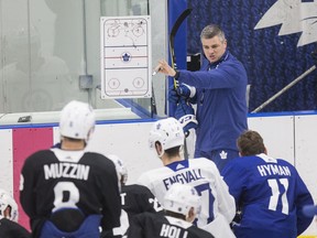 Maple Leafs head coach Sheldon Keefe, leading practice in Etobicoke on Monday, says he plans to take a measured approach while trying to get to know the players. “One player at a time, one day at a time,” he said. (CRAIG ROBERTSON/TORONTO SUN)