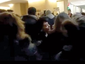 Protesters try to shut down a pro-Israel event at York University on Nov. 20. Police are investigating.