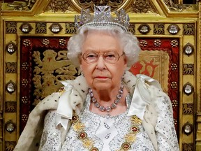 Queen Elizabeth sits in The Sovereign's Throne during the State Opening of Parliament in the House of Lords at the Palace of Westminster in London, Britain Oct. 14, 2019.