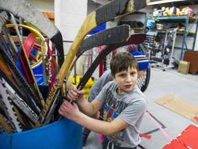Variety Village ambassador Pierce Williams, 7, gears up for some ball hockey at Variety Village.