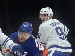 John Tavares of the Toronto Maple Leafs faces Anders Lee of the New York Islanders on April 01, 2019 in Uniondale, N.Y. (BRUCE BENNETT/Getty Images files)