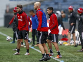 Toronto FC midfielder Michael Bradley (centre) and his teammates train in Seattle on Saturday. USA TODAY