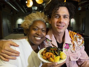 The Arkells' lead singer Max Kerman and chef Suzanne Barr pose for a photo in Toronto,  Nov. 13, 2019. (Stan Behal/Toronto Sun/Postmedia Network)
