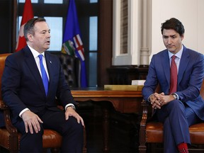 Jason Kenney, premier of Alberta, left, speaks while Justin Trudeau, Canada's prime minister, listens on Parliament Hill in Ottawa, Ontario, Canada, on Thursday, May 2, 2019. Photographer: David Kawai/Bloomberg