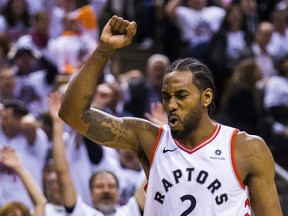 A smiling Kawhi Leonard during Toronto Raptors  2nd half Game 5 Eastern Conference playoff action against Philadelphia 76ers at the Scotiabank Arena  in Toronto, Ont. on Tuesday May 7, 2019. Ernest Doroszuk/Toronto Sun/Postmedia
