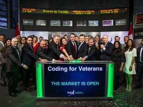 Ringing the opening at bell at the TSX in support of the Coding for Veterans initiative in Toronto, Ont. on Friday November 22, 2019. Ernest Doroszuk/Toronto Sun/Postmedia