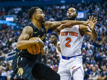 Toronto Raptors Norman Powell during 1st half action against New York Knicks Wayne Ellington at the Scotiabank Arena in Toronto, Ont. on Wednesday November 27, 2019. Ernest Doroszuk/Toronto Sun/Postmedia