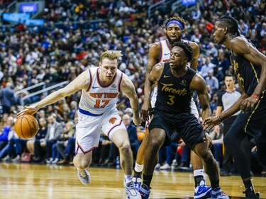 Toronto Raptors OG Anunoby during 2nd half action against New York Knicks Ignas Brazdeikis at the Scotiabank Arena in Toronto, Ont. on Wednesday November 27, 2019. Ernest Doroszuk/Toronto Sun/Postmedia