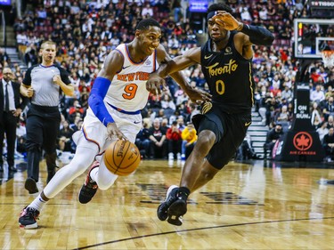 Toronto Raptors Terence Davis II during 2nd half action against New York Knicks RJ Barrett at the Scotiabank Arena in Toronto, Ont. on Wednesday November 27, 2019. Ernest Doroszuk/Toronto Sun/Postmedia