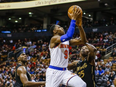 Toronto Raptors Chris Boucher during 2nd half action against New York Knicks RJ Barrett  at the Scotiabank Arena in Toronto, Ont. on Wednesday November 27, 2019. Ernest Doroszuk/Toronto Sun/Postmedia