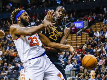 Toronto Raptors Chris Boucher  during 2nd half action against New York Knicks 	Mitchell Robinson at the Scotiabank Arena in Toronto, Ont. on Wednesday November 27, 2019. Ernest Doroszuk/Toronto Sun/Postmedia