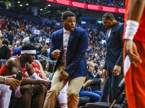 Toronto Raptors' Kyle Lowry talks with player during a break in action. (ERNEST DOROSZUK/Toronto Sun)